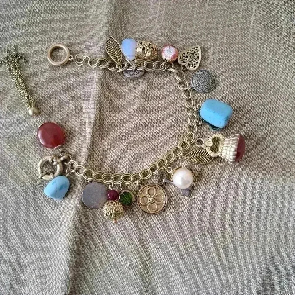 Bracelet from Greece rusty designs full of Charms
